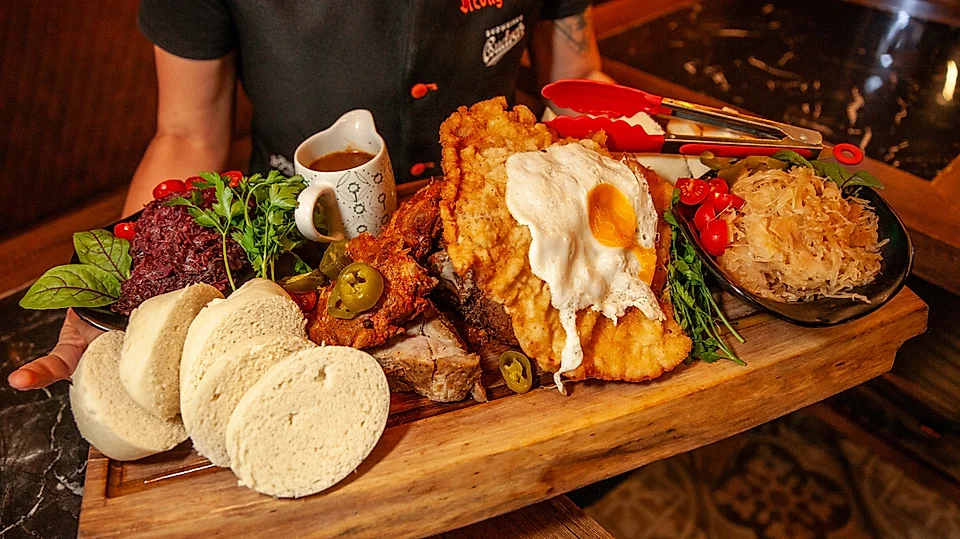 Meat platter with Czech dumplings and fried egg – Czech food in Poznań